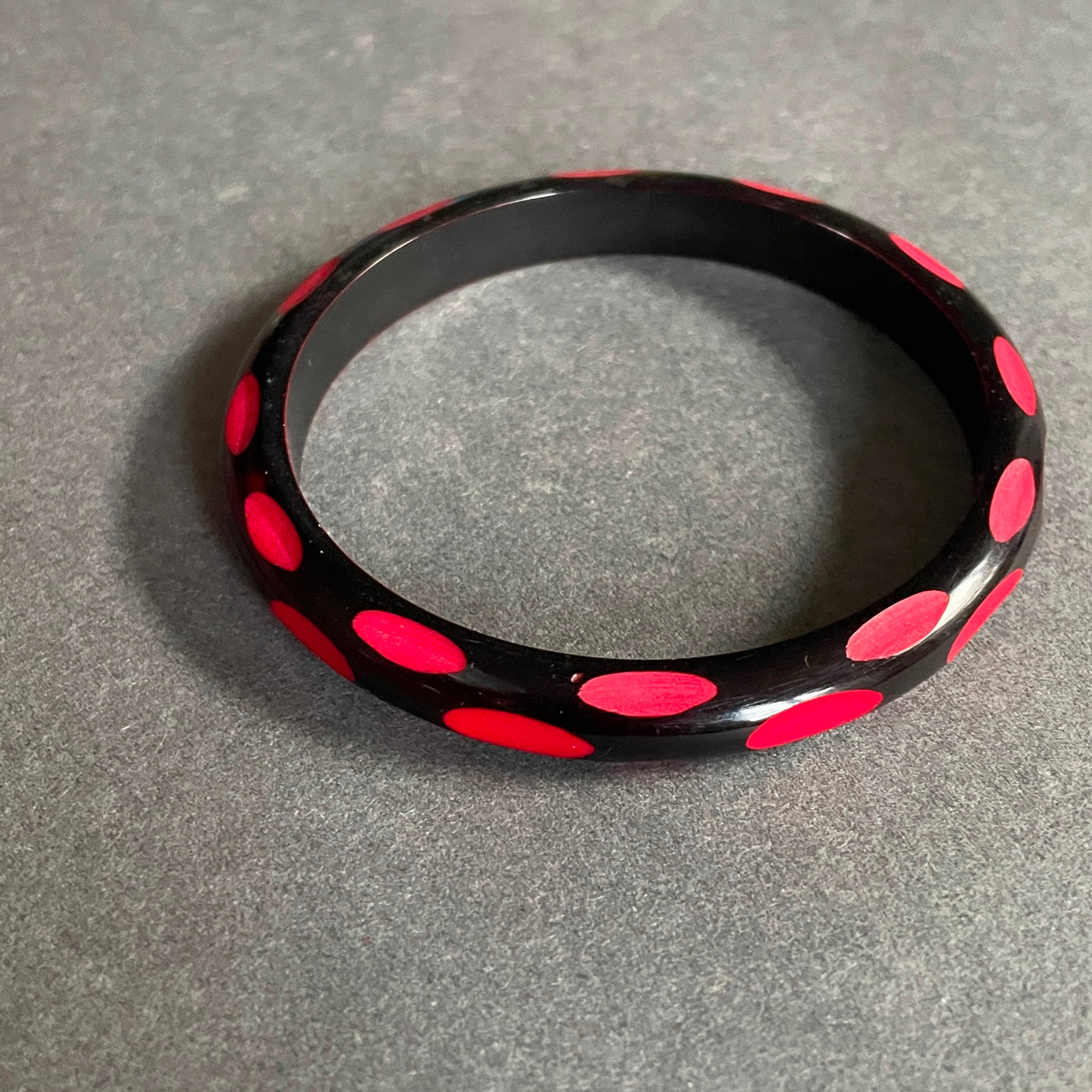 2.5/8" D Black Cut Away Carved Red Ovals Bangle Bracelet Vintage