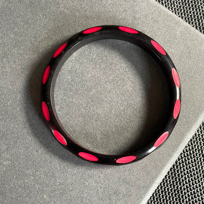 2.5/8" D Black Cut Away Carved Red Ovals Bangle Bracelet Vintage