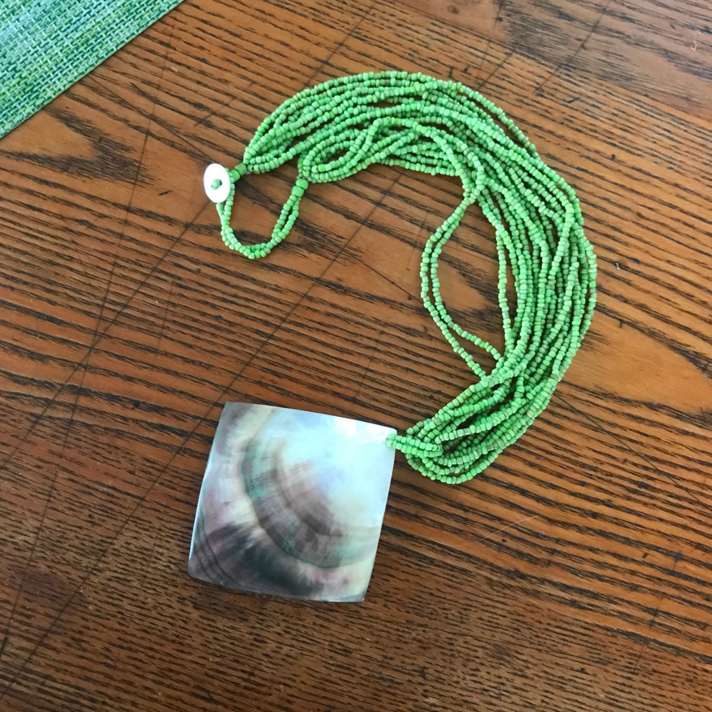 18" Hand Crafted Multi Strand Green Bead & Shell Medallion Necklace